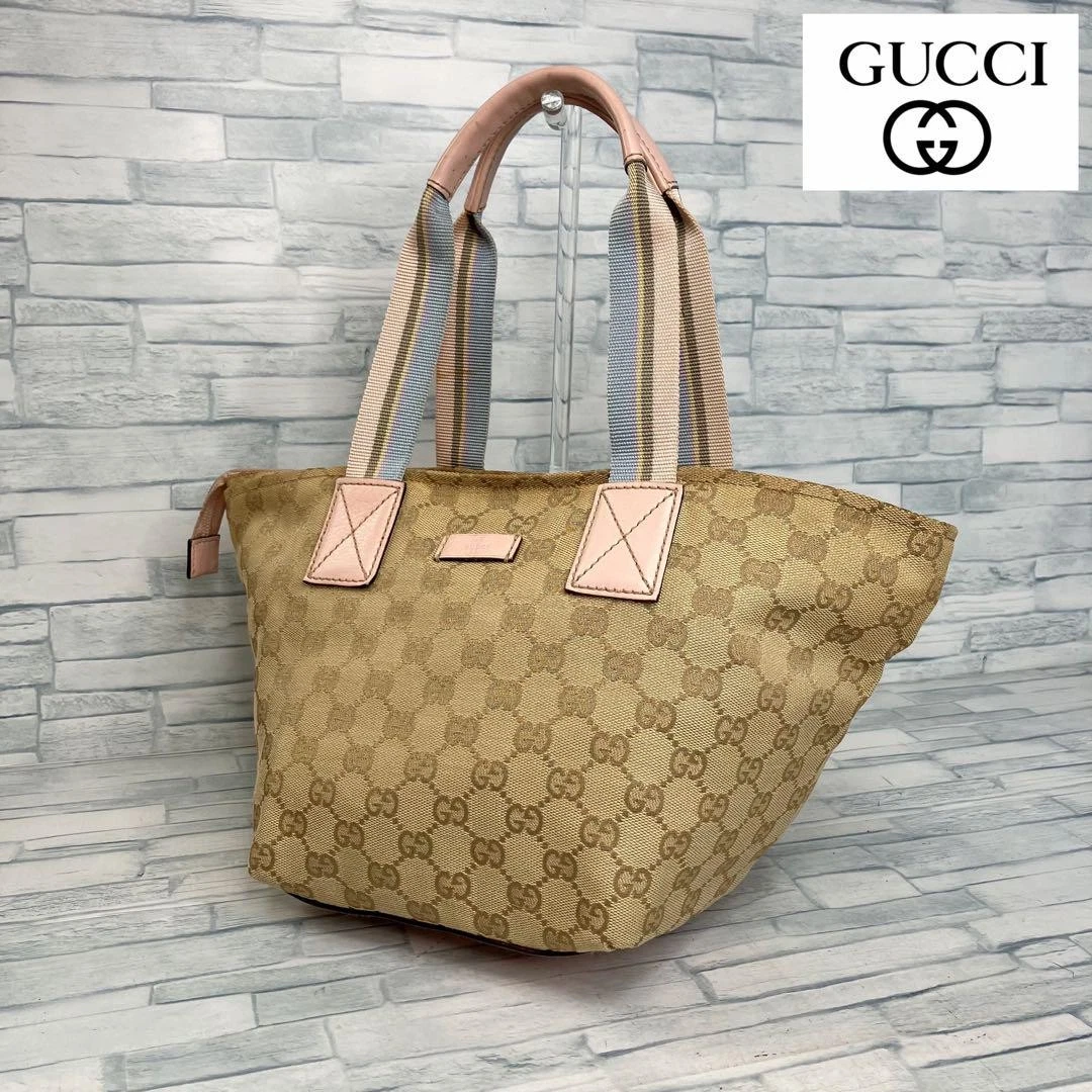 Sac à main 100 Extreme Beauty GUCCI motif GG