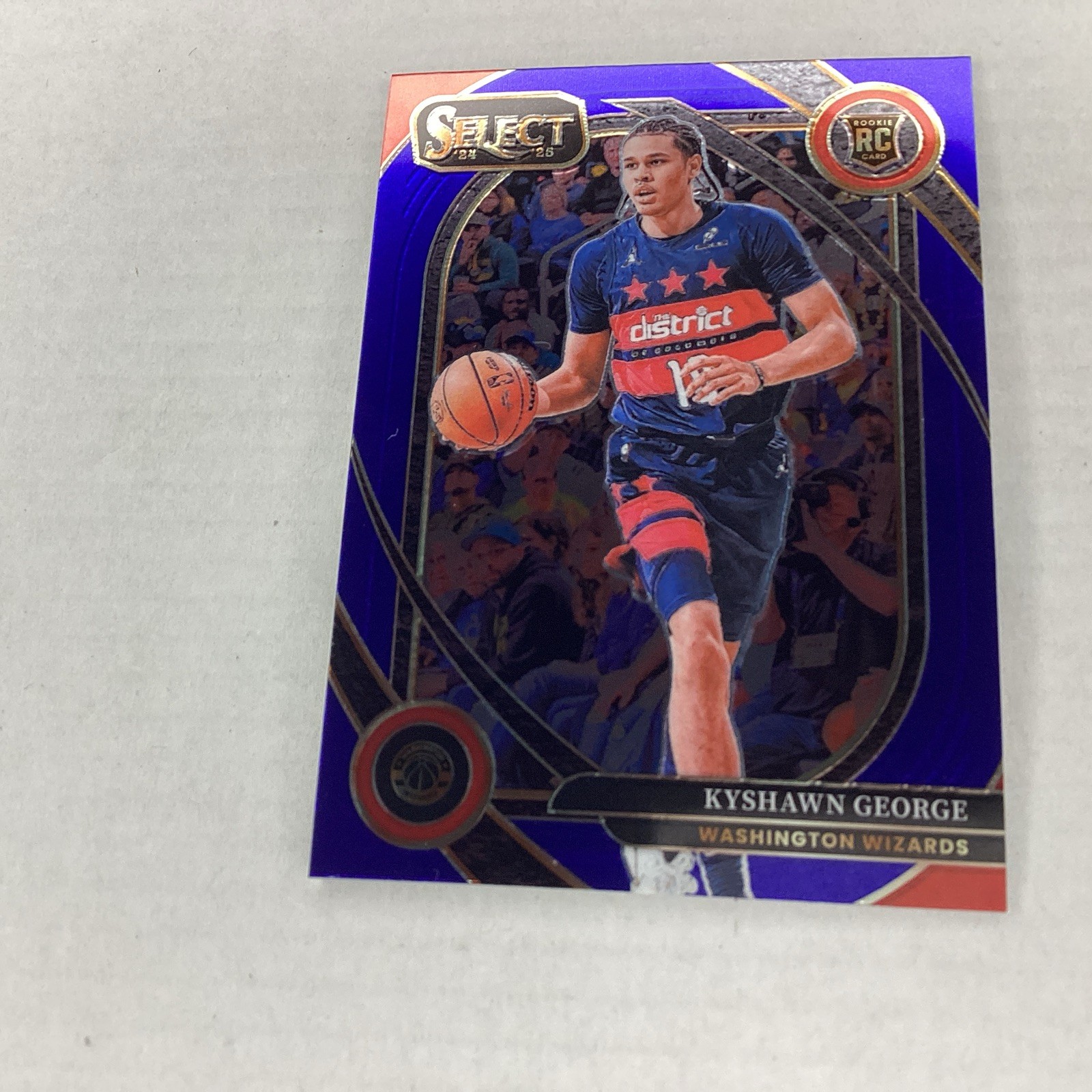 2024-25 Panini Select  Courtside Kyshawn George #285 Blue Cracked Ice Prizm (RC)