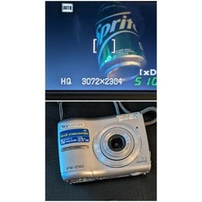 Olympus FE-210 Digital Camera Silver 7.1MP 3x Optical Zoom 1GB xD Card Works