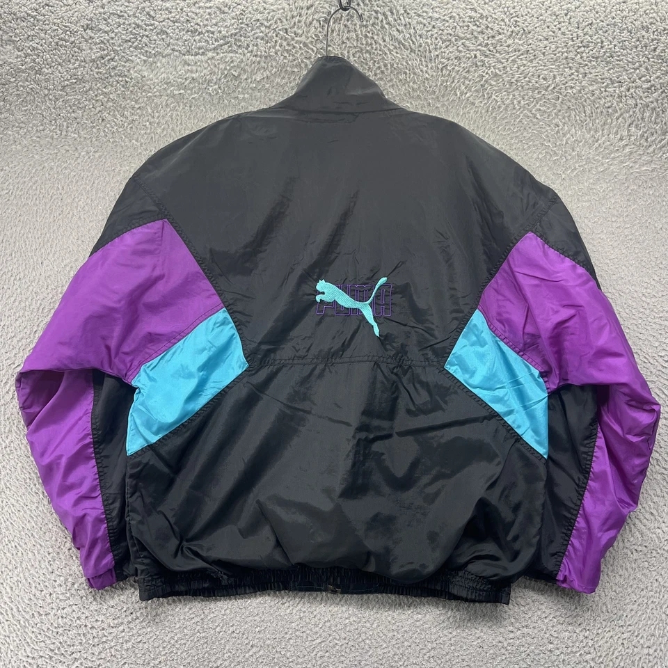 Chaqueta cortavientos vintage Puma para hombre mediana negra púrpura azul cremallera completa años 90 nailon Foto 2 de 4