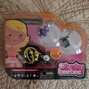 NIP Jakks Pacific Lucky BeeBee Child's Yellow Bracelet with Rabbit & Sushi Charm