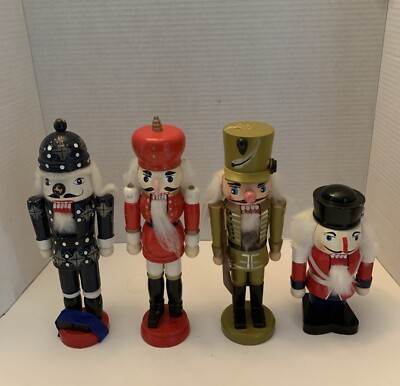 Lot Of 4 Wooden Nutcrackers