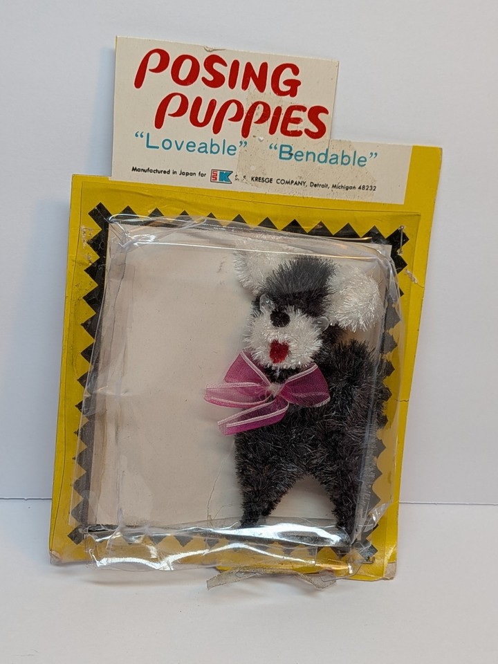 Deadstock 1960s pipe cleaner puppy figurines hand-made in Japan and sold at Kresge — tiny, whimsical folk art that survived 60 years still in packaging.