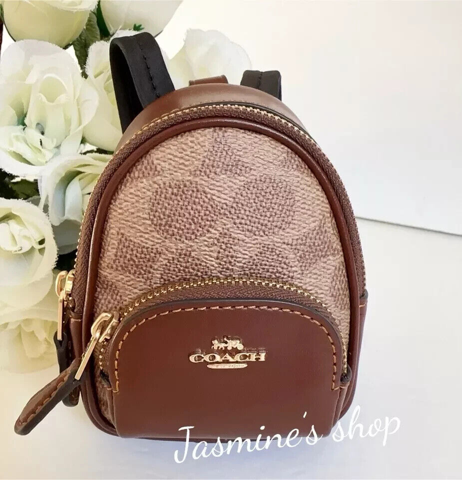 NWT Coach Mini Bag Charm In Signature With cherry Print NWT Coach Mini Bag Charm In Signature With cherry Print