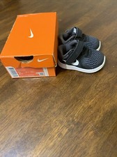 Nike Unisex-Child Revolution 4 TDV Running Shoe Toddler 2C USA