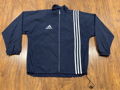 blue adidas jacket with white stripes