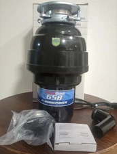 Waste Maid 1-1/4 HP Premium Garbage Disposal with Attached stainless steel 1-1/4