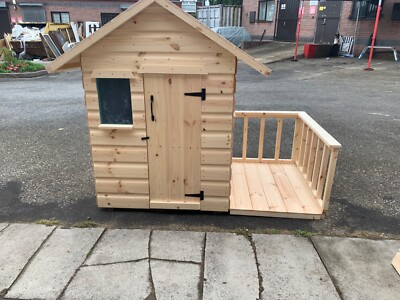 small wooden wendy house