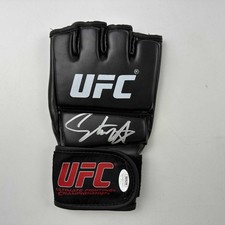 Autographed/Signed Israel Izzy Adesanya Black UFC Glove Fighting JSA COA