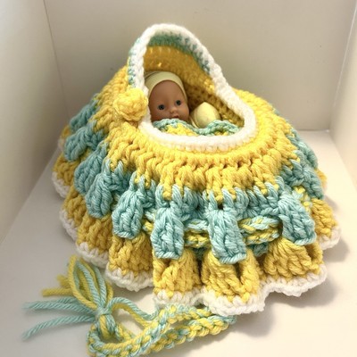 Crochet Cradle/Purse With A  Suprise Baby Doll Inside, Yellow, White, Lt. Blue.