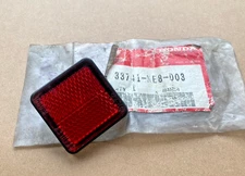 HONDA REAR REFLEX REFLECTOR FOR VT600 VTR250 VF750 XR250R NOS 33741-KE8-003