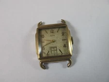 ELGIN MENS CALIBER 554 WITH FANCY CURLED LUGS RECTANGULAR