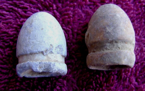 (2) DUG CIVIL WAR DROPPED .69 CALIBER FRENCH DRAGOON BULLETS (PORT HUDSON)