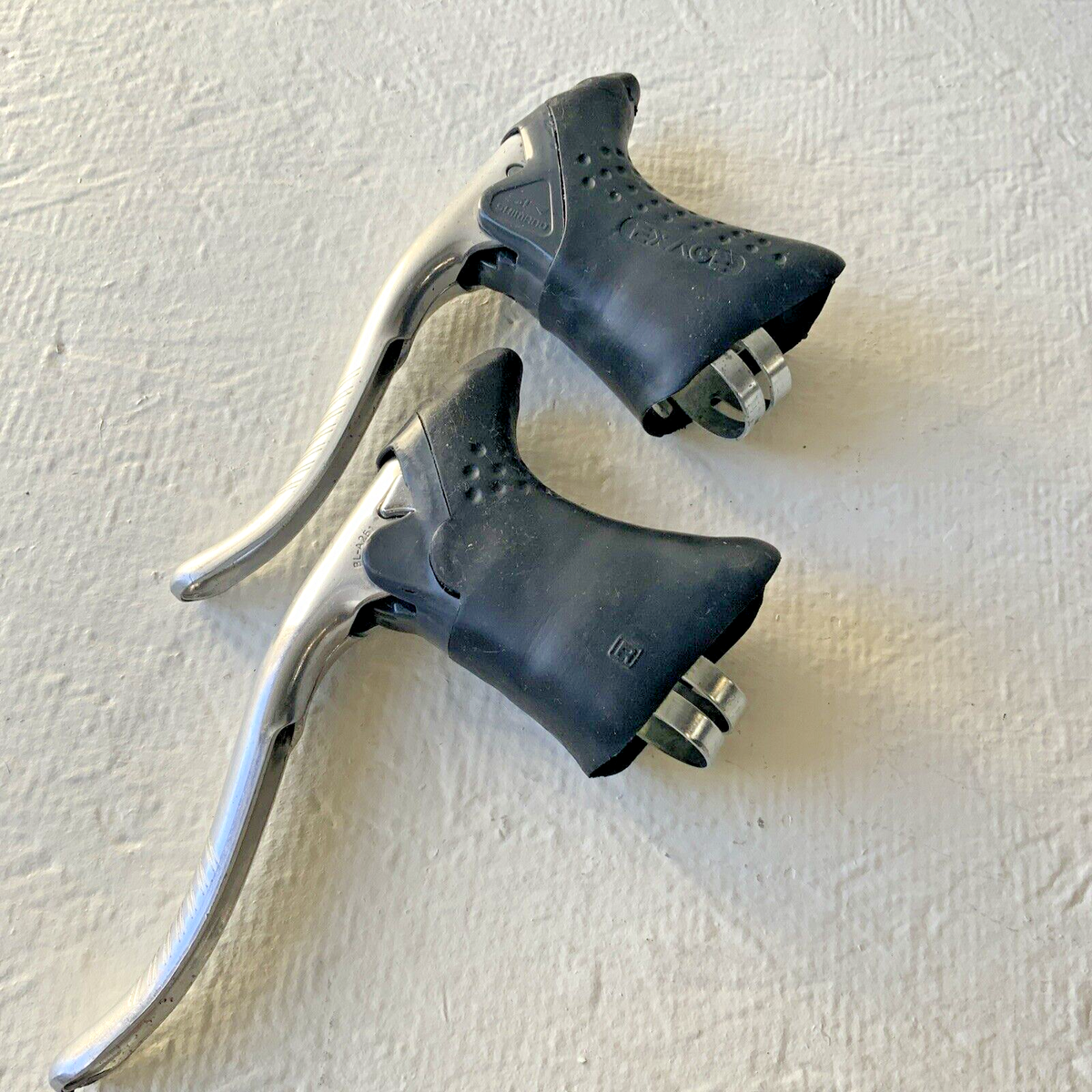Paire De Leviers De Frein Shimano EXAGE Motion SLR Aero BL-A251, Blancs, Aluminium