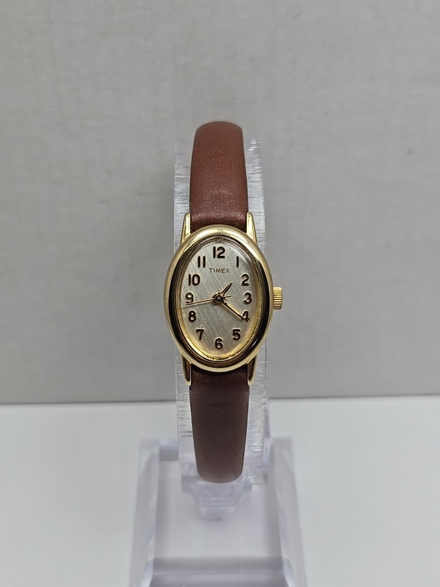 Vintage Timex Cavatina Gold Tone Oval Womens Watch Leather 