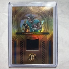 2024 Panini Gold Standard - Gold Rush #GR-TEJ Travis Etienne /299 (MEM)