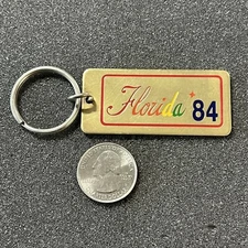 1984 Florida 84 Gold Tone Metal Souvenir Keychain Key Ring #42568