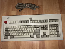 Red, white and black IBM Model M