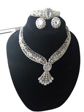 Mojisola Adeola Gbadamosi Metallic Jewelry Set. 