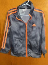 Kids Adidas Jacket Size 5 Gunmetal Print With Orange Stripes