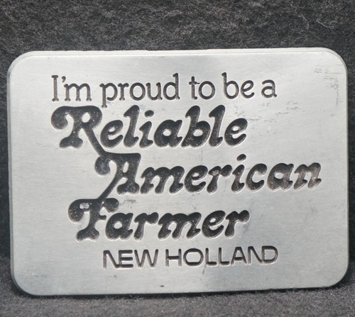 XG23139 VINTAGE 1982 **NEW HOLLAND** RELIABLE AMERICAN FARMER BELT BUCKLE