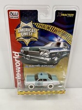 Rare Auto World Xtraction Ultra-G Slot Car 1974 Dodge Monaco Iwheels Chase 1/150