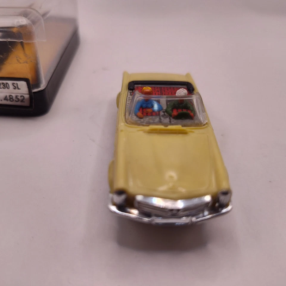 Трассовая автомодель Faller AMS 4852 Mercedes 230 SL HO бледно-желтая с чехлом винтажная Tjet - Изображение 4 из 4
