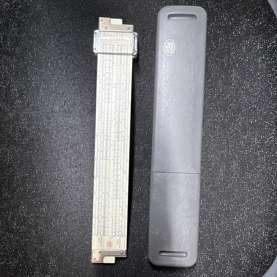 A classic Frederick Post Versalog 1460 — the gold-standard engineer's slide rule used by NASA-era professionals, complete with its original leather case.