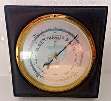 DIPLEX German Leather clad Barometer on a wooden base measures 17 x 17cm x 4cm.