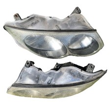 1999-2004 Chrysler 300M Headlights PAIR Chrome 04780012 04780013