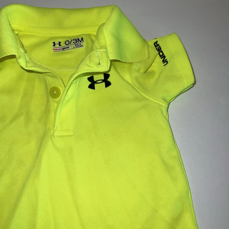 Polo Under Armour HeatGear Infantil Una Pieza a Presión Amarillo Brillante 0/3M Recién Nacido Foto 3 de 4