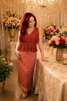 Crimson Elegance: A Fusion of Pleated Grace and Timeless Pattern