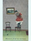 Bamforth WOMAN AFRAID OF MOUSE STANDS UP ON CHAIR o8057