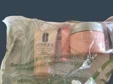 Clinique 4 pc Moisture Surge Skincare Set w/Red Floral Zipper Bag Travel Sizes