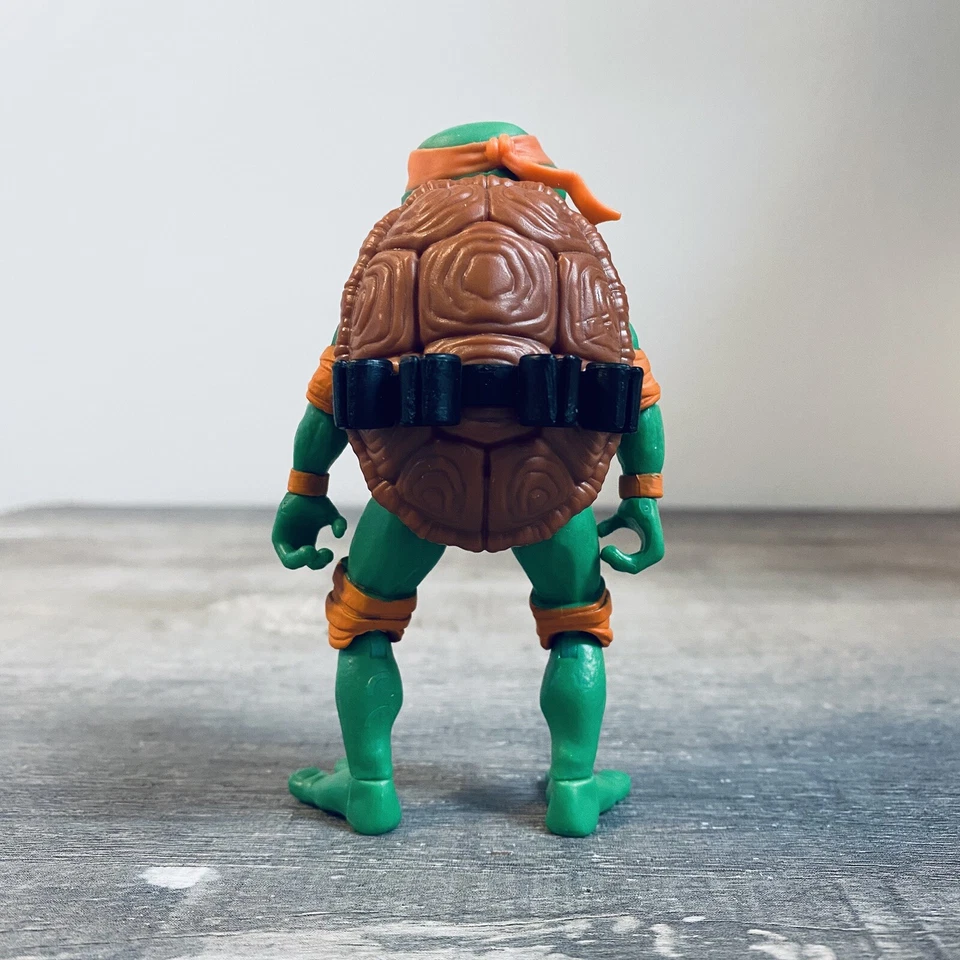 Teenage Mutant Ninja Turtles: Mutant Mayhem Battle Pack: Figura suelta de Mikey Foto 3 de 4