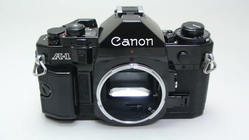 ⏯️ *MINT & Olympic Cap* Canon A-1 BLACK 35mm Film SLR Camera New FD 50mm... - Video 1 of 1