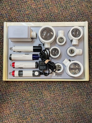 Eschenbach Illuminated Handheld Magnifier set with 4 handles and 8 heads