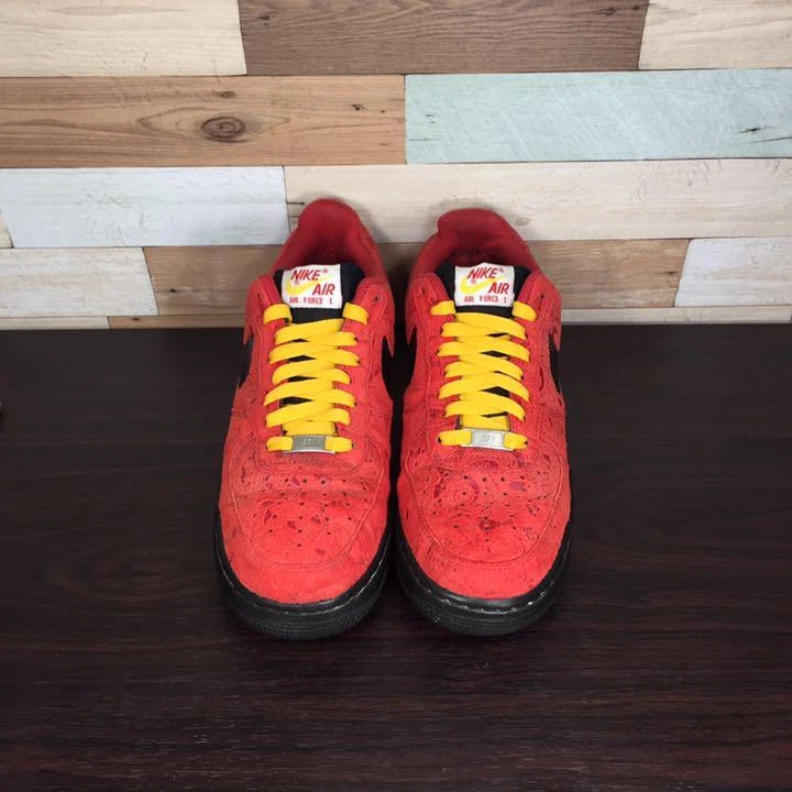 Red and black clearance nikes with yellow laces