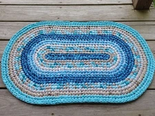 Handmade rag rug oval sand and sea ree-vick made 31" by 19"