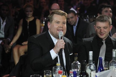 James Corden with Plan B seated at tables during The BRIT Awards 2- Old Photo