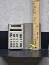 Texas Instruments TI-1706 Vintage Solar Calculator with Tan Wallet Case Tan