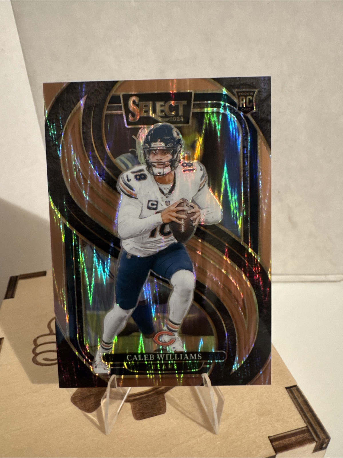 2024 Panini Select Caleb Williams #114 Copper Prizm Shock Premier Level /299