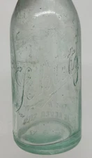 Light green Antique Schlitz beer bottle
