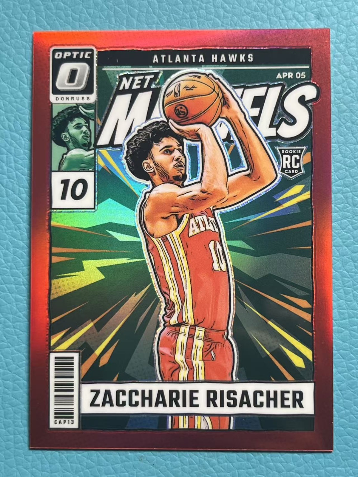 Zaccharie Risacher 2024-25 Panini Donruss Optic 73/99 Net Marvels Red RC #25