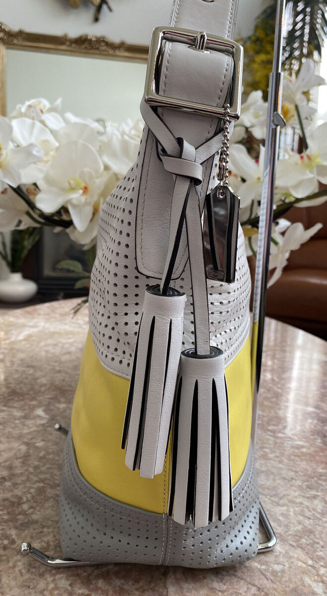 COACH 22412 LEGACY MULTICOLOR PERFORATED STRIPE DUFFLE COACH 22412 LEGACY MULTICOLOR PERFORATED STRIPE DUFFLE