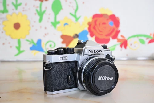 Nikon FE-2 35mm Film Camera w/50mm f/1.8 Pancake Lens Mint-