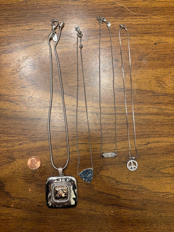 lot of 4 silver toned costume jewelry necklaces