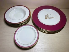 Set of 13 pieces of PICKARD CHINA Burgundy Dinner Plates with "The Meadows" logo