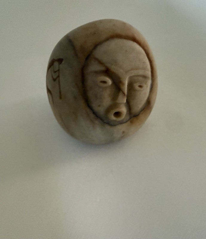 Carved Stone with Face and Kokopelli Figure Sculpture