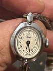 Vtg Timex Watch Women's 17mm Oval Silver Tone Wind Up Stretch Band Collectible